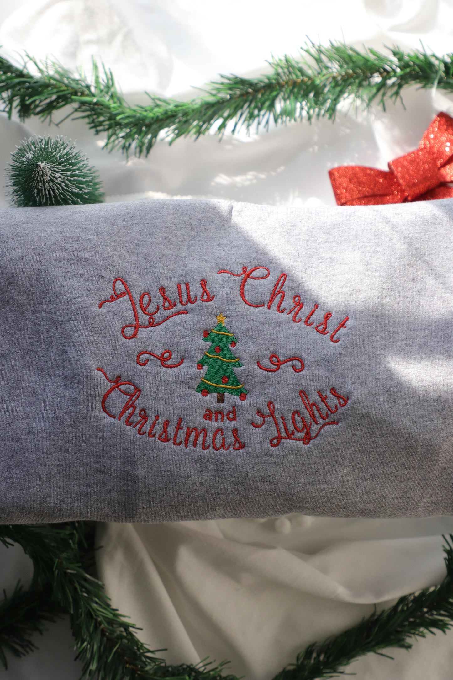 Jesus Christ & Christmas Lights Embroidered Crewneck